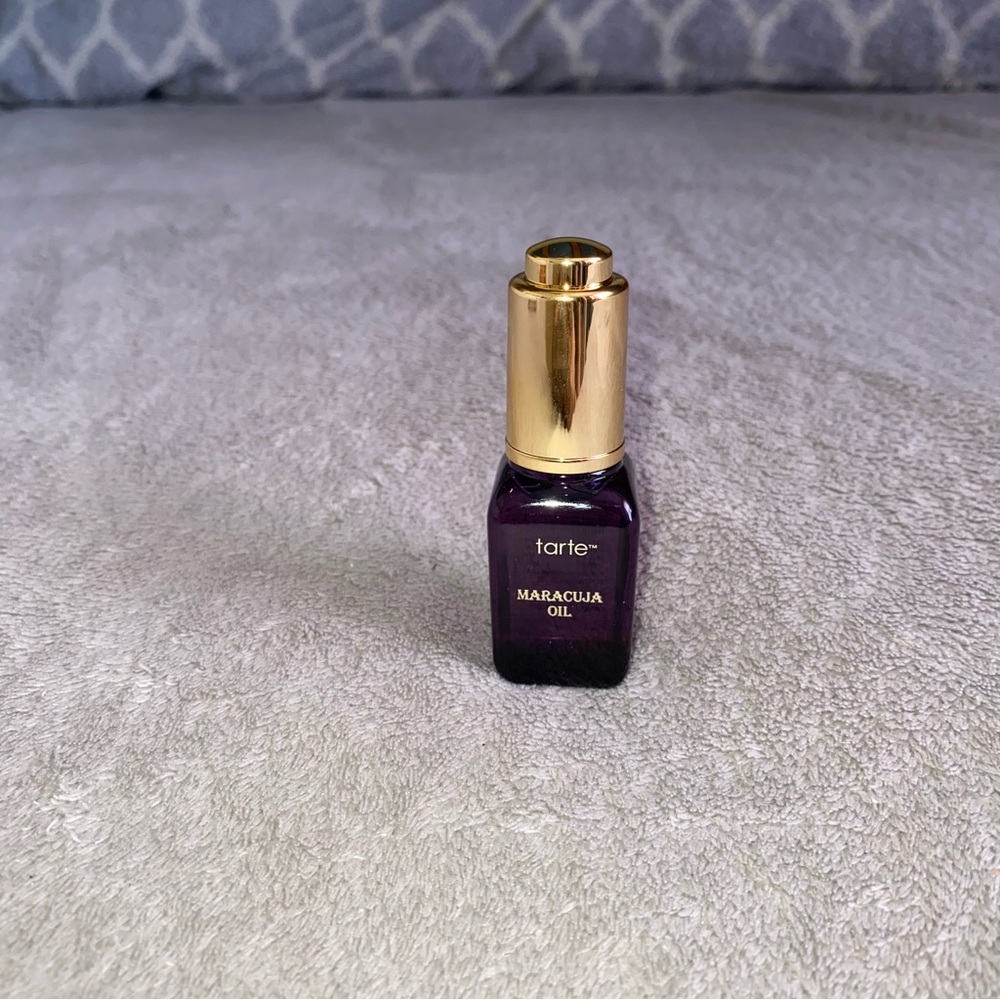 Tarte Maracuja Oil with Purple Bottle and Gold Cap